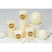 Candela cilindrica profumata avorio 9 cm