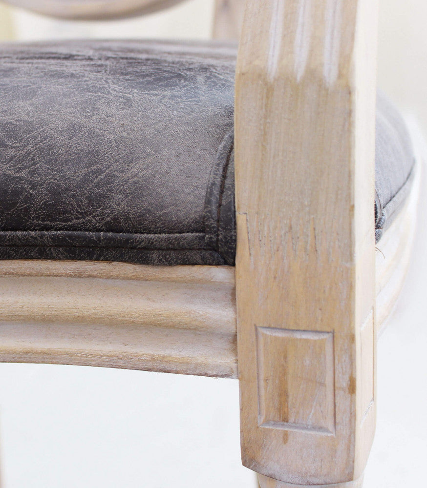 Poltrona constance in ecopelle nera